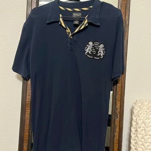 Men’s navy polo with Buffalo brand crest on the chest